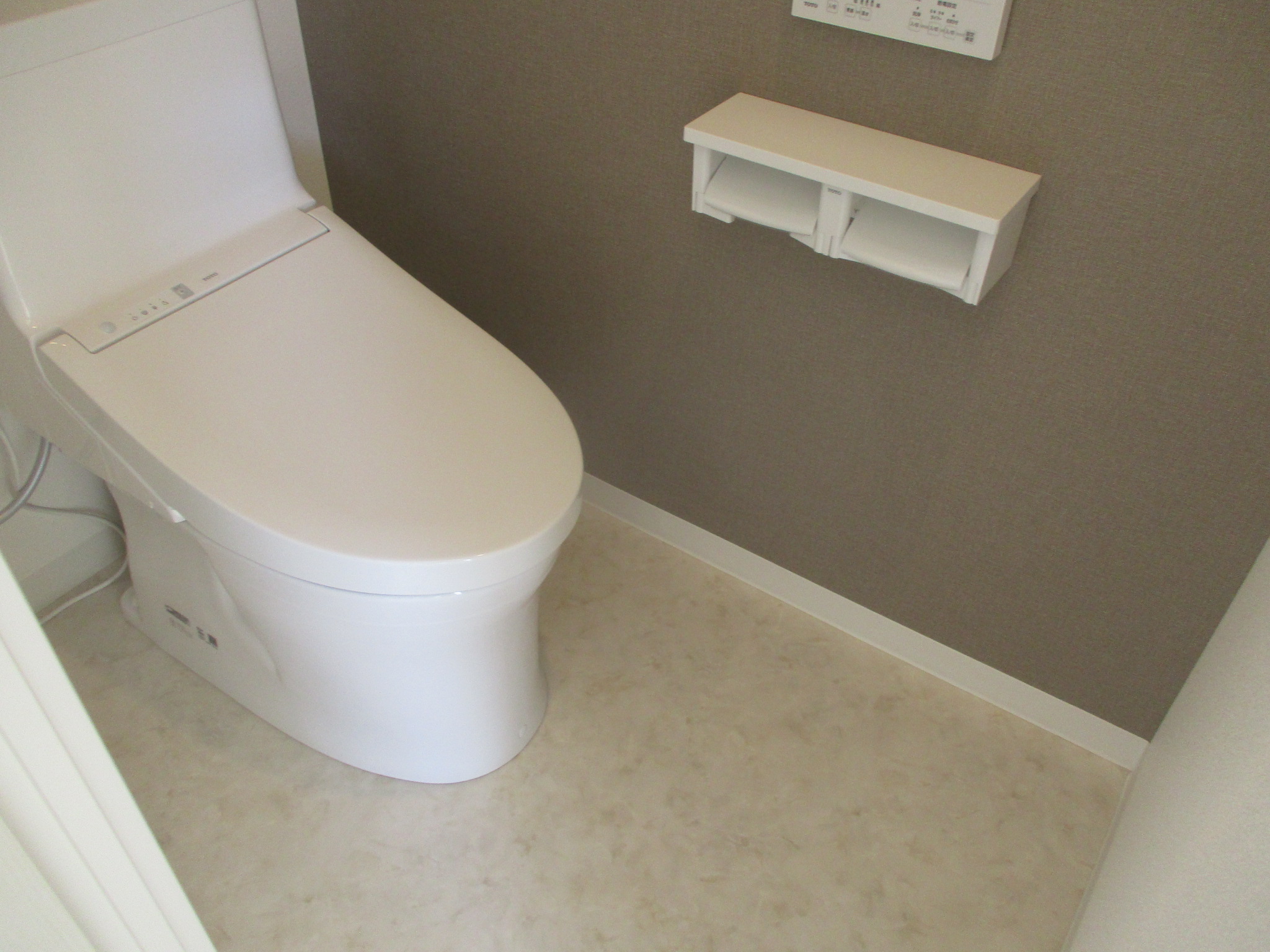 トイレ アクセントクロス 施工後