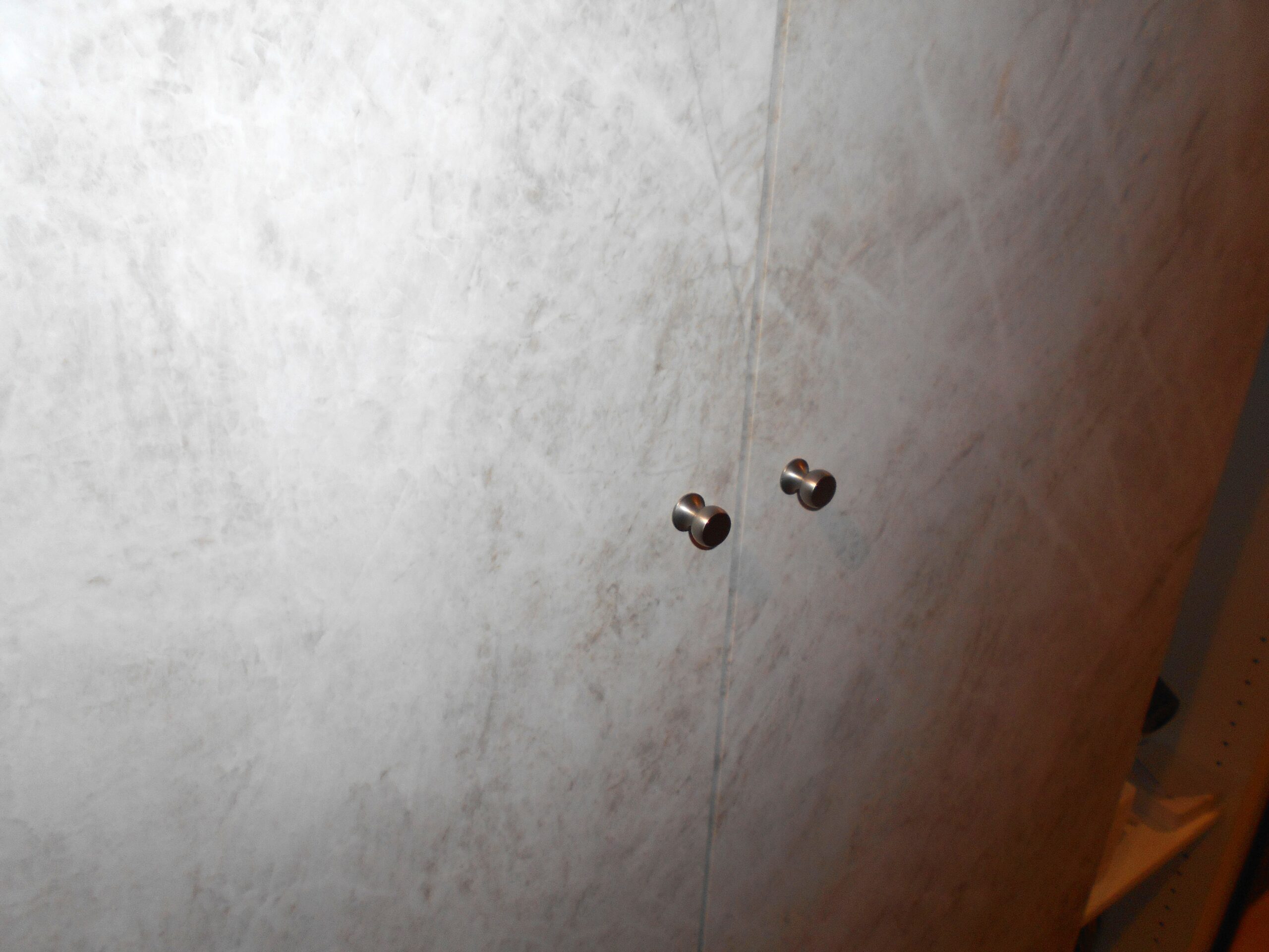 町田市建具シート貼り施工後 廊下収納扉 大理石風